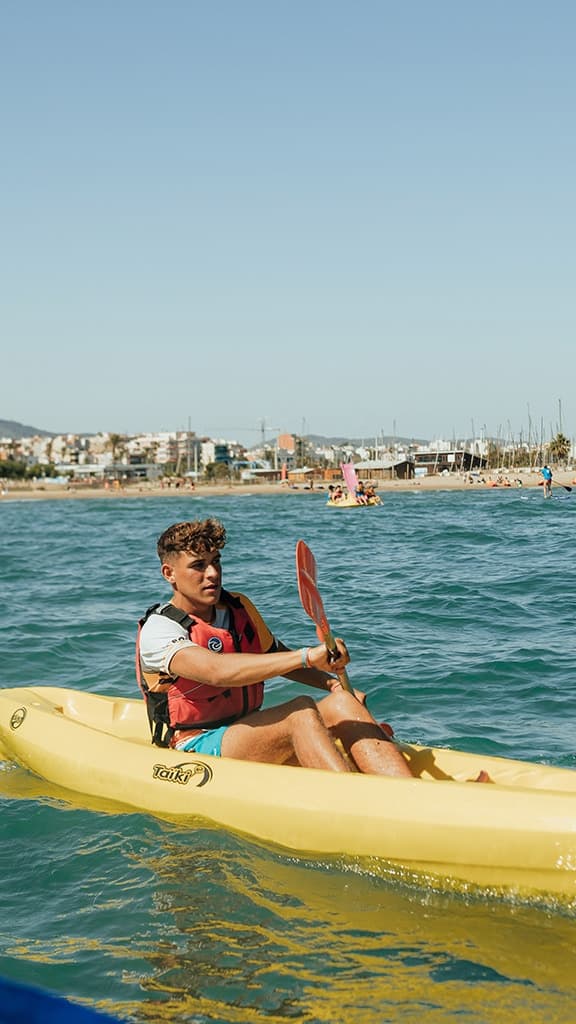 Kayaker paddling along the Vilanova i la Geltrú coast during a 1h rental session.